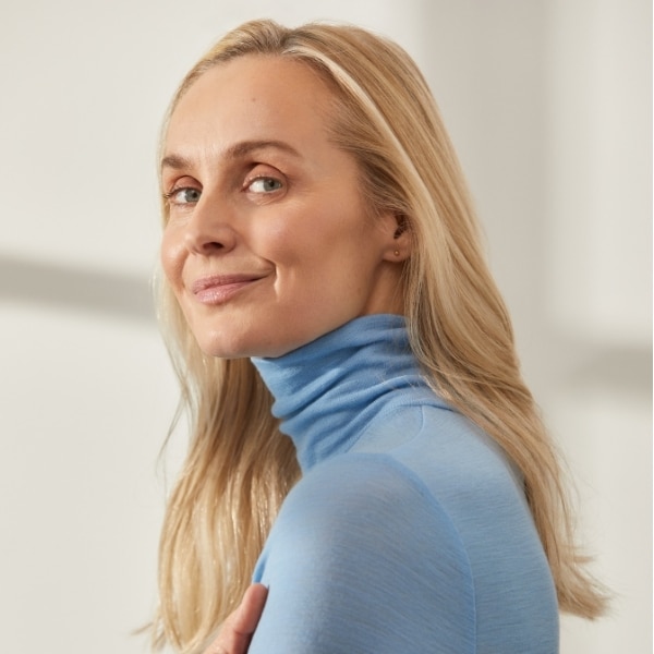 middle aged model looking over shoulder
